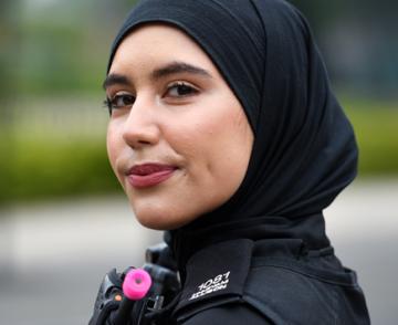 A close up of the author, Yassin Desai, wearing the Blue Light Hijab